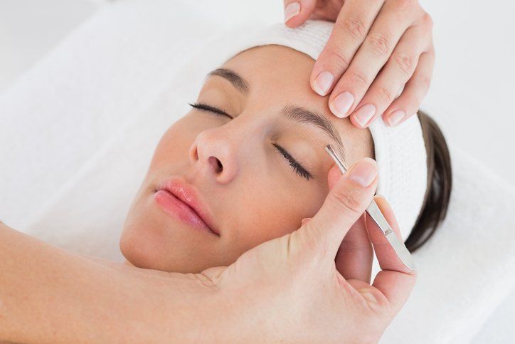Eyebrow Waxing — Woman Having Eyebrow Removal in West Springfield, MA