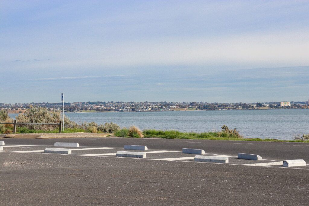 Empty Parking Lot With White Barriers — Adaptive Care Pty Ltd In Geelong, VIC