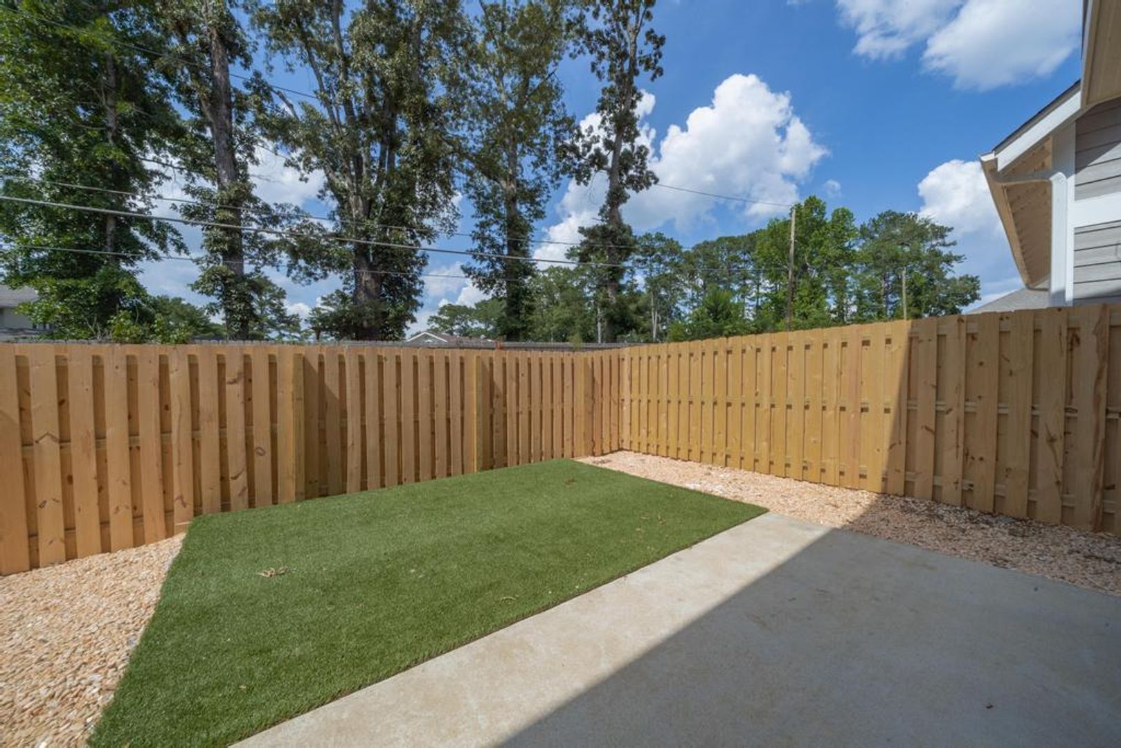 Patton Crest backyard with fencing and grass area for pets