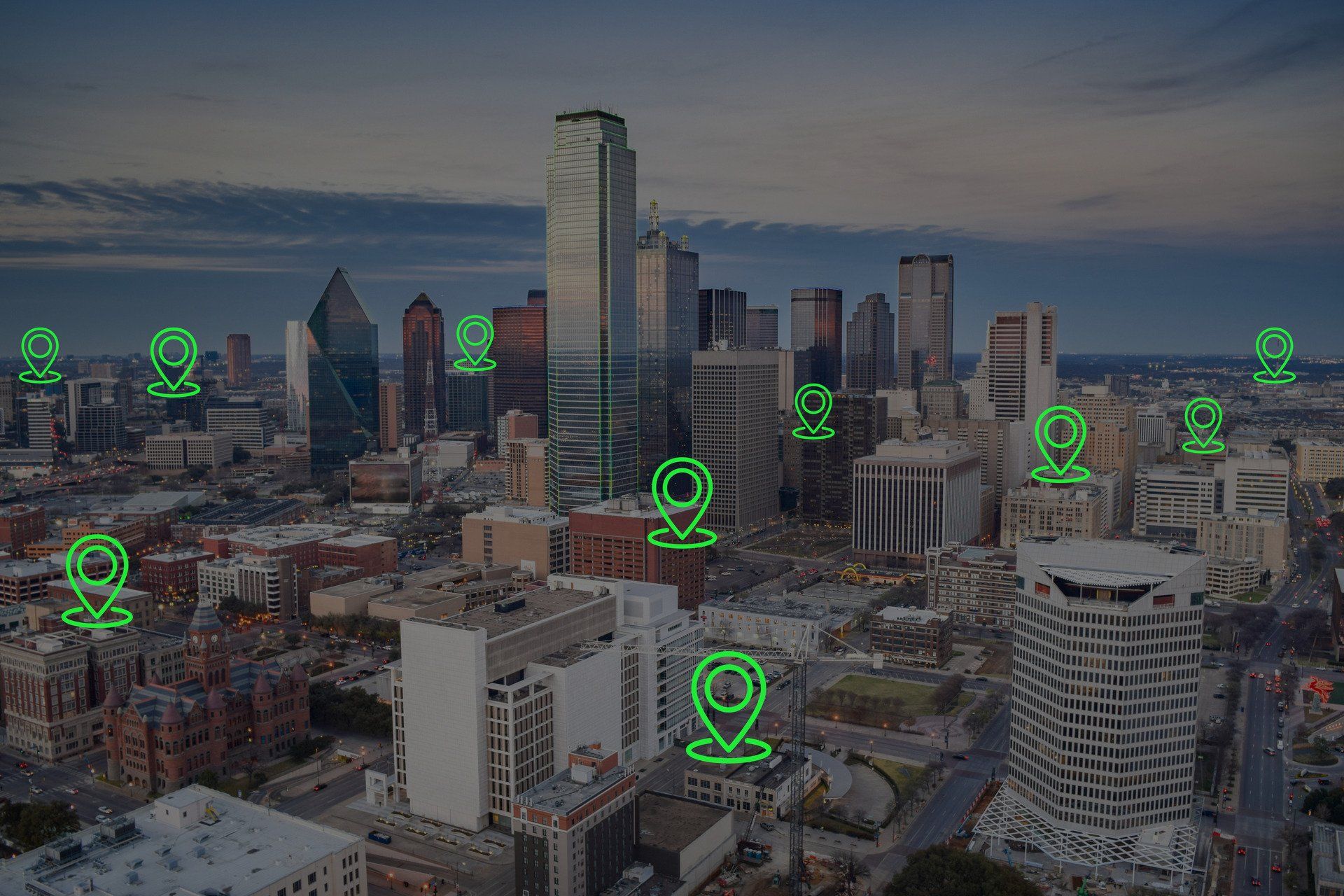 skyline view of Dallas Texas with pin  locations in green showing potential small business clients