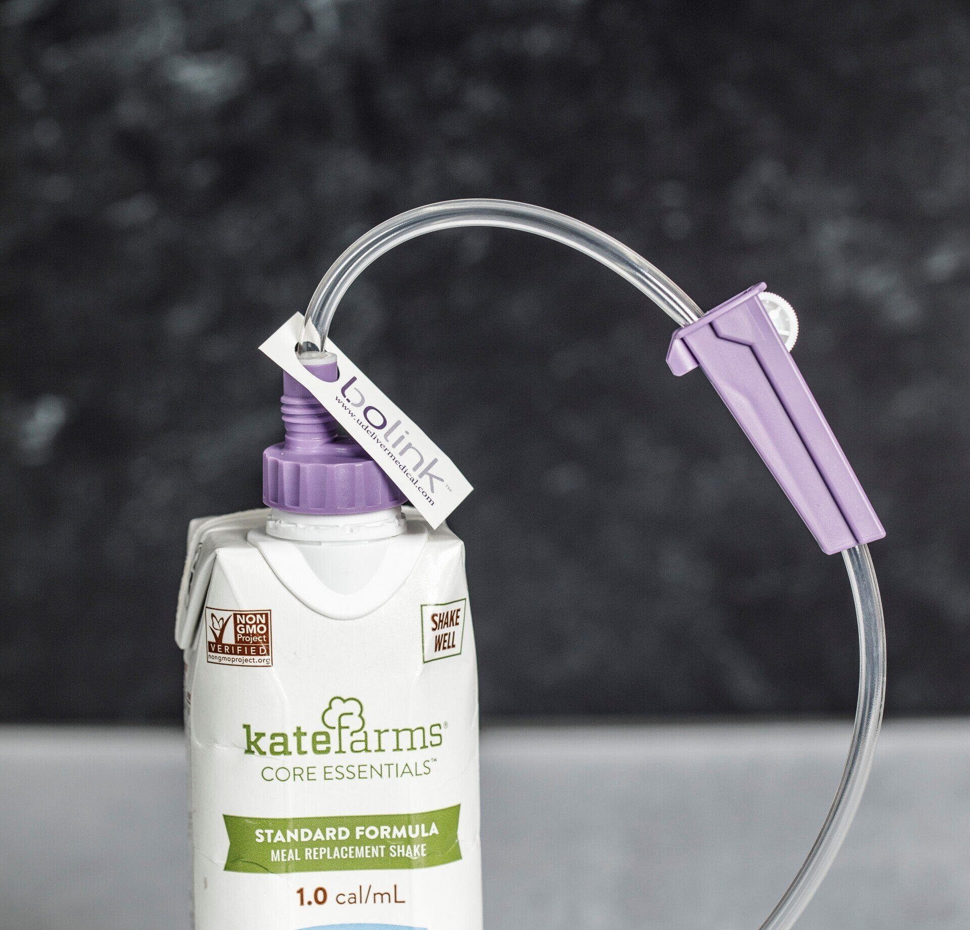 Bolink D Cap attached to a Kate Farms carton