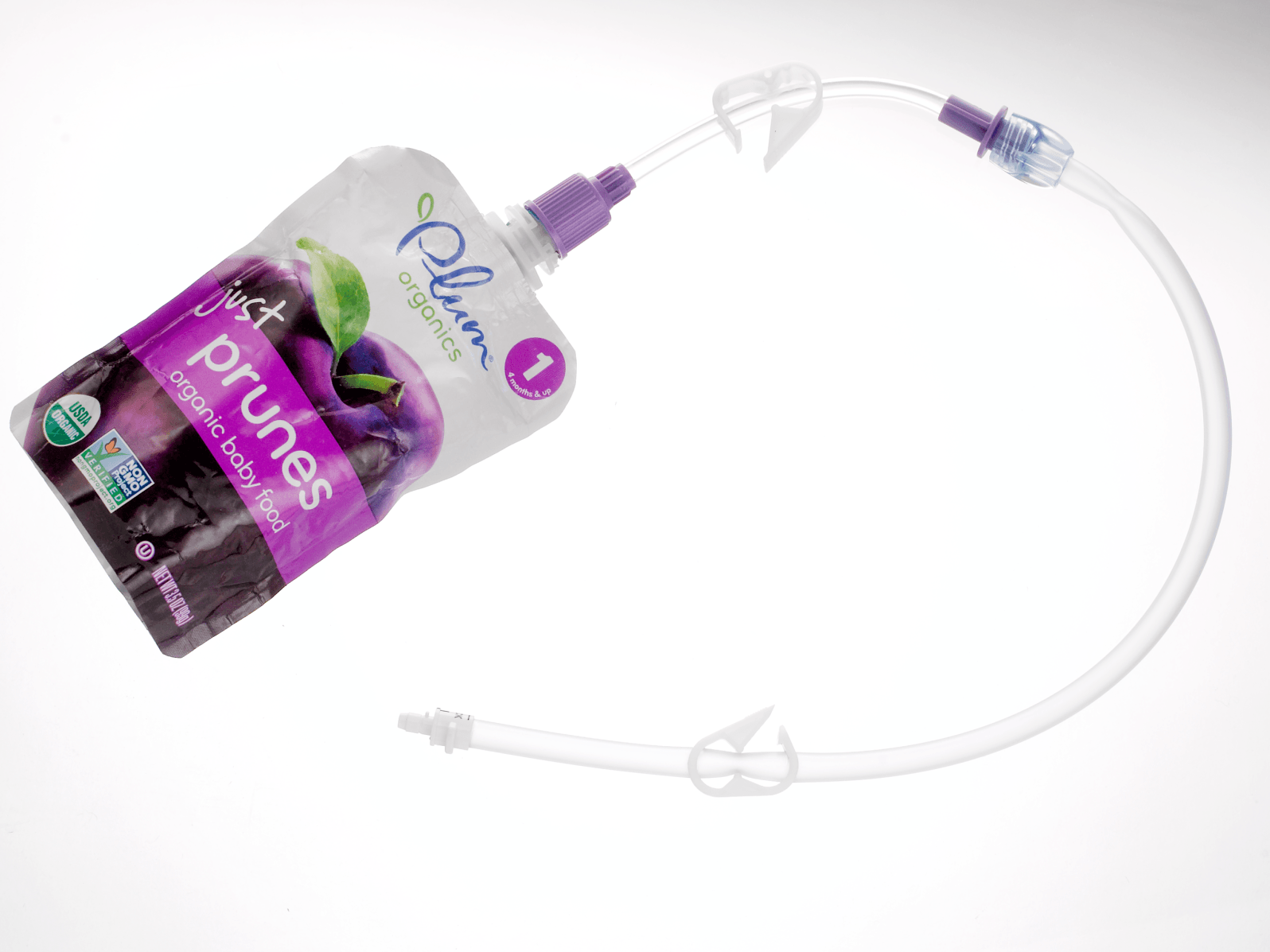 Bolink Small Cap attached to a puree pouch and bolus extension set