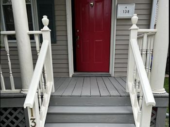 A red door with the number 138 on it