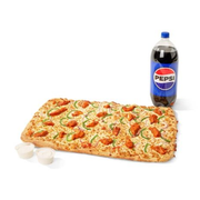 A large pizza next to a bottle of pepsi