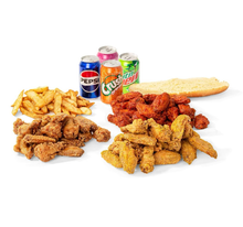 A variety of fried chicken wings , french fries , sodas and a sub sandwich.