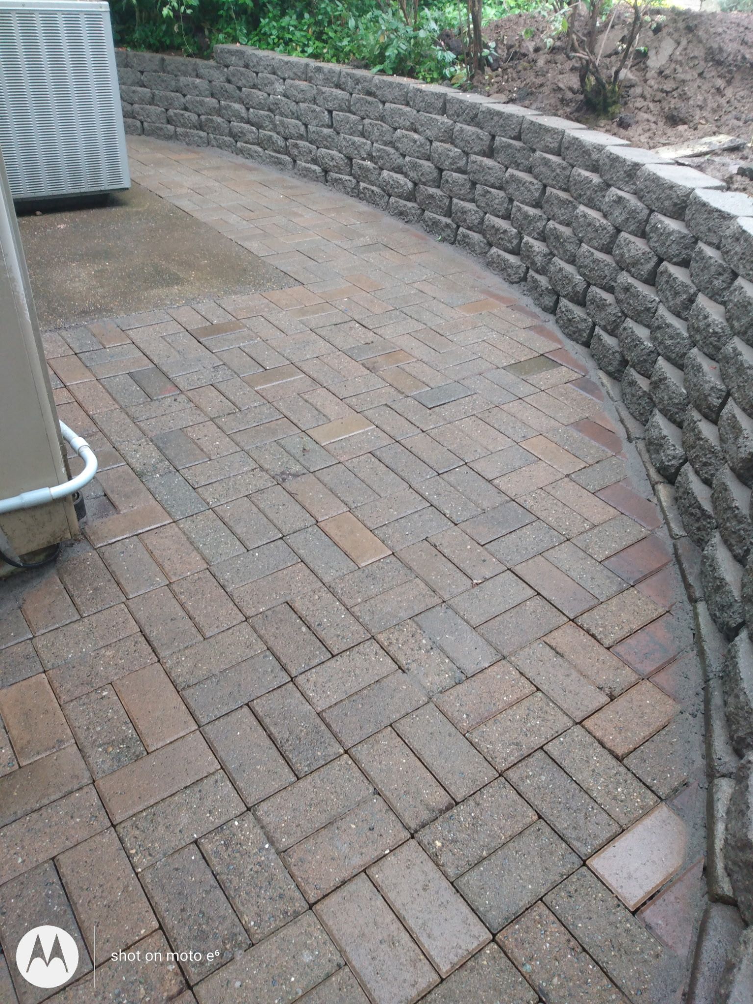 A concrete foundation is being built in a residential area.