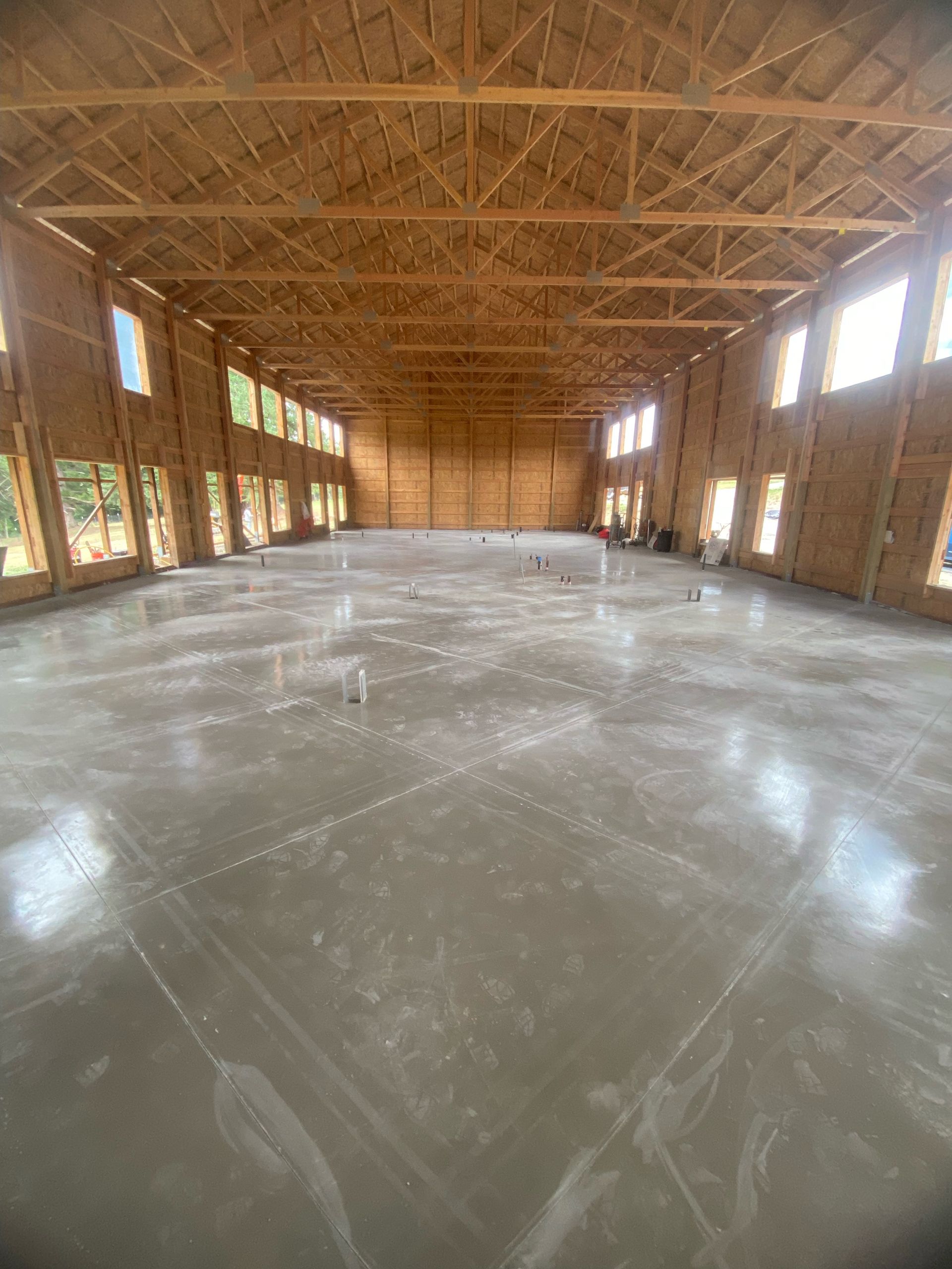 A row of houses are lined up on the side of a road