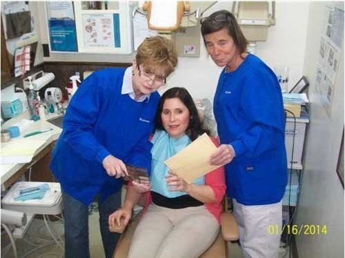 Family Dentists — Dental Hygienists with Patient in Newington, CT