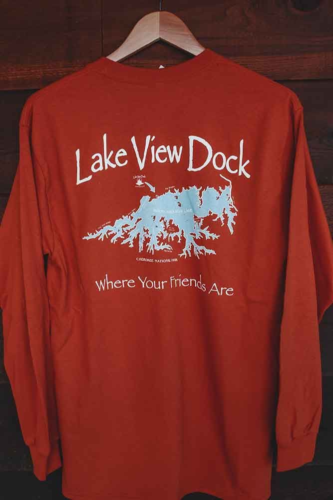 A red lake view dock shirt is hanging on a hanger