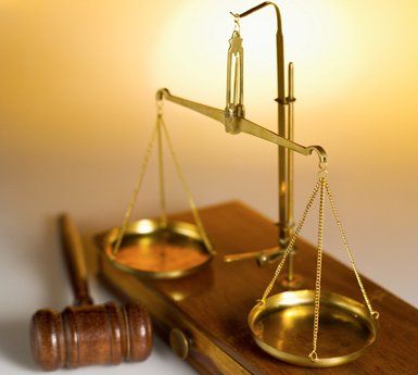 Scales of Justice with Gavel - Civil Litigation in Salina, KS