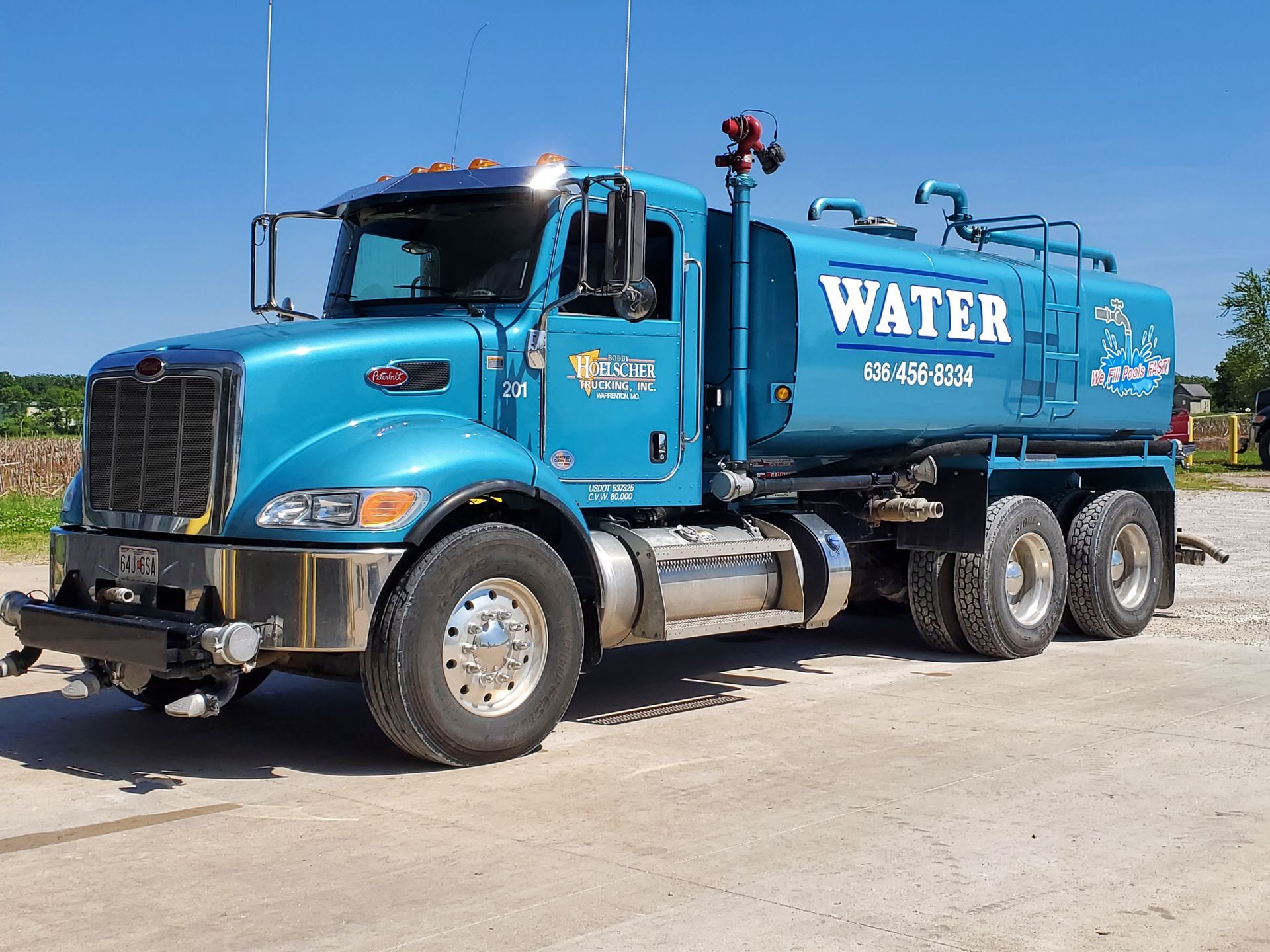 Blue water tanker truck with 
