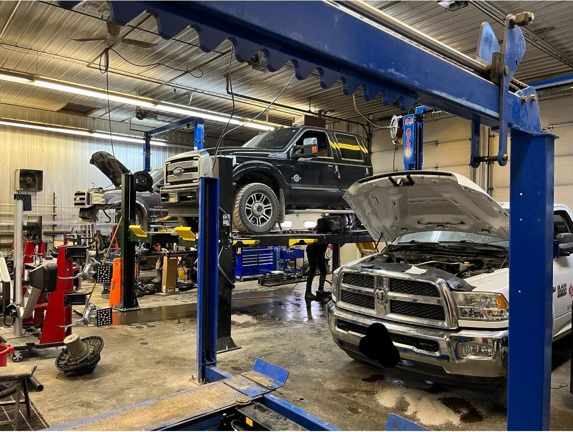 Vehicles Raised On Lifts During Suspension And Mechanical Repairs | Sumners Automotive