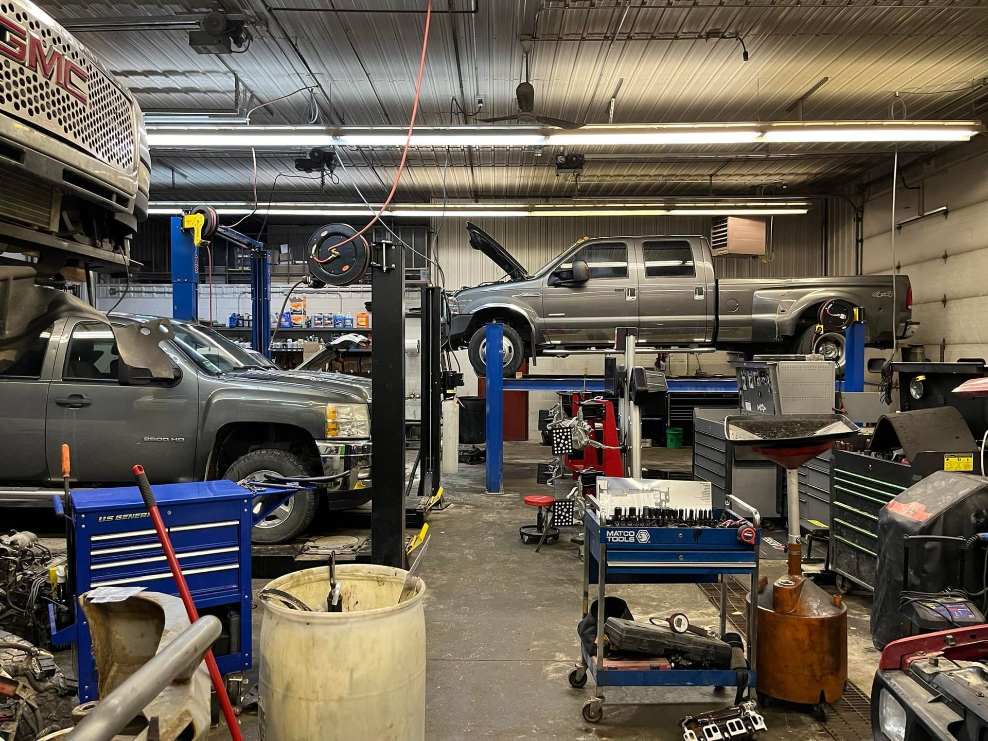 Full-Service Auto Repair Shop Interior With Multiple Vehicles | Sumners Automotive