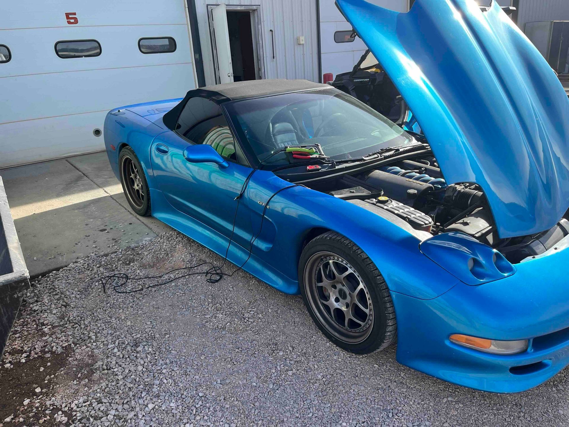 Blue Sports Car Undergoing Inspection With Hood Open | Sumners Automotive