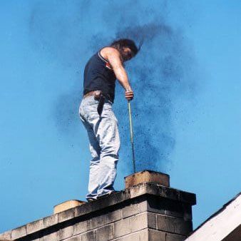 Man Cleaning on Chimney — Wayne, NJ — Chimney Pros Man Cleaning on Chimney — Wayne, NJ — Chimney Pros