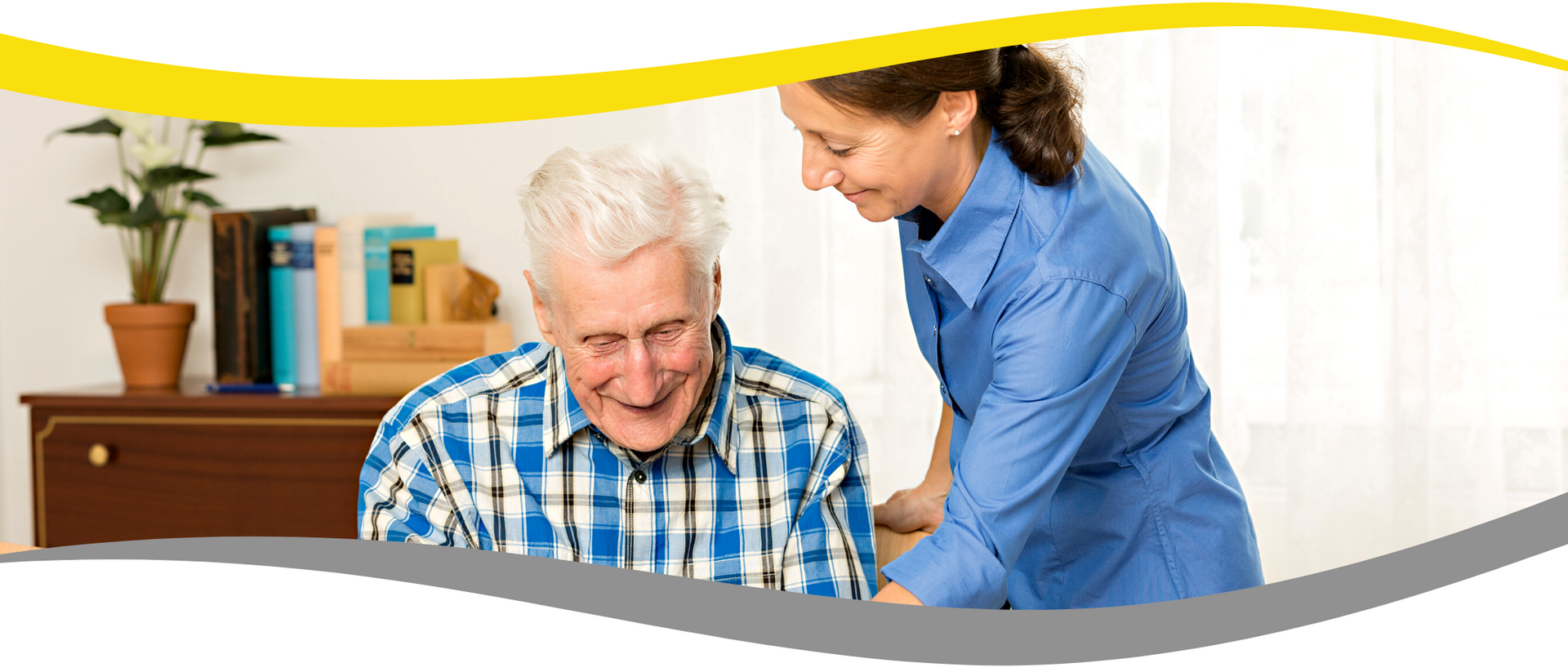 A woman is standing next to an older man in a plaid shirt.