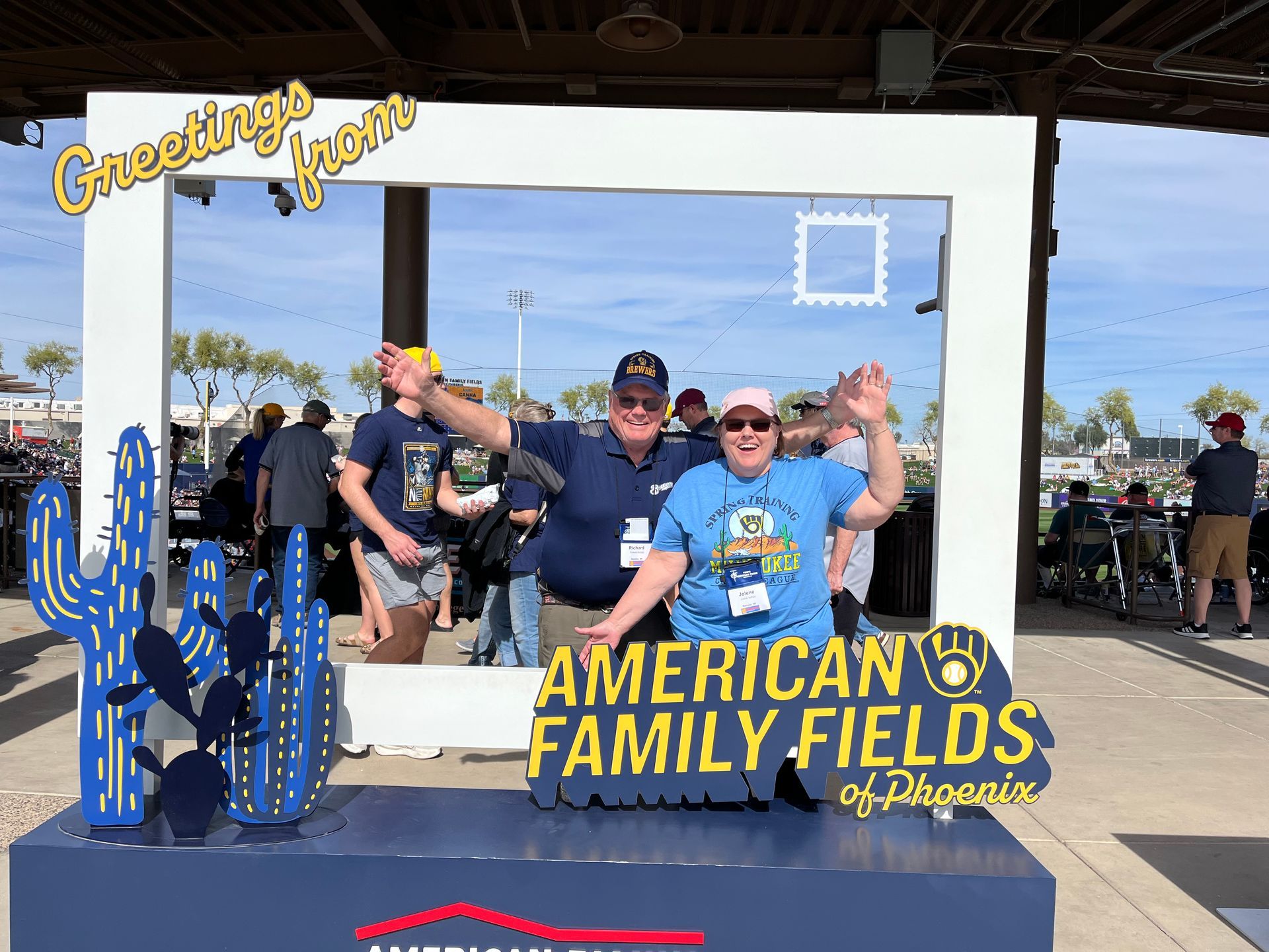 People posing in a photo frame at 