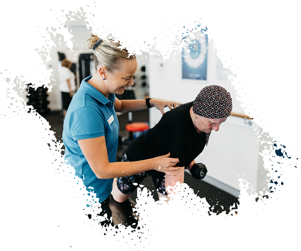 staff assisting elderly patient