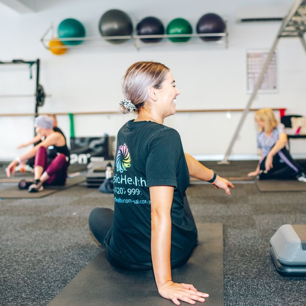 CanConquer staff member with patients