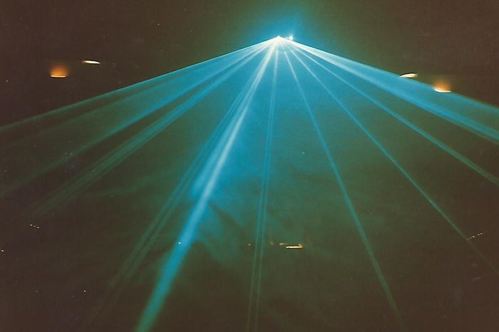 Blue laser beams seen through atmospheric smoke