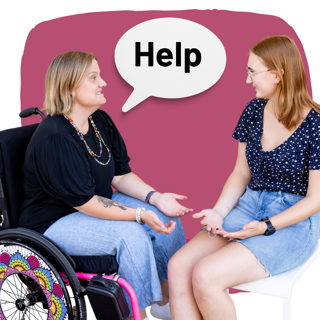 2 women sitting, 1 in a wheelchair who has a speech bubble saying 