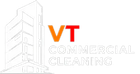 White outline of a building with "VT COMMERCIAL CLEANING" text.