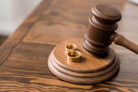 Divorce Law with gavel and rings