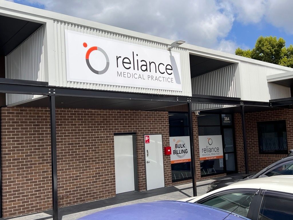A Brick Building with a Sign that says Reliance Medical Practice on it — Metric CNC In Morisset, NSW
