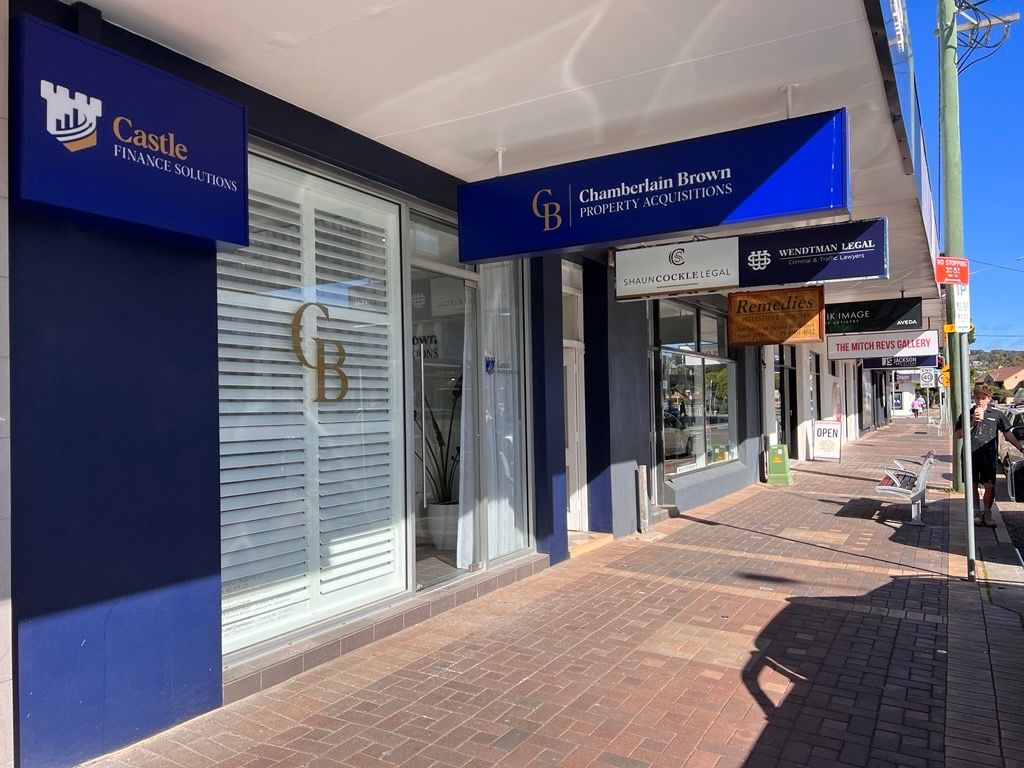A Store Front With a Blue Sign — Metric CNC In Morisset, NSW