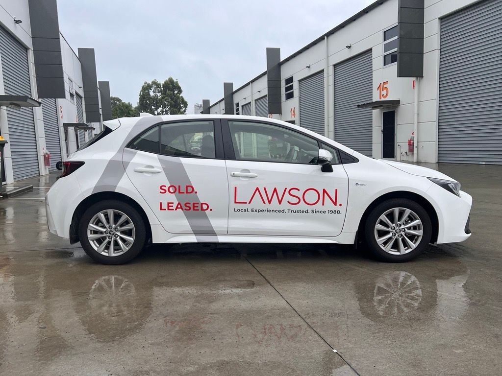 A White Car with the Word Lawson on the Side — Metric CNC In Morisset, NSW