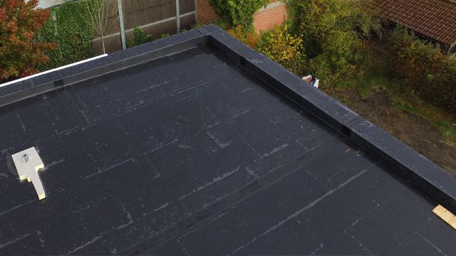 a white roof with a lot of vents on it