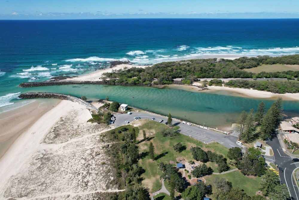 An Aerial View Of A Beach With A River Running Through It — Kingscliff Tweed Coast Taxis Pty Ltd In Kingscliff, NSW