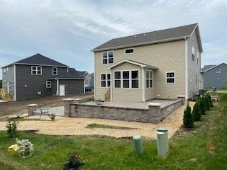 Modern House with Retaining Walls — Harvard, IL — Power Tree & Landscaping