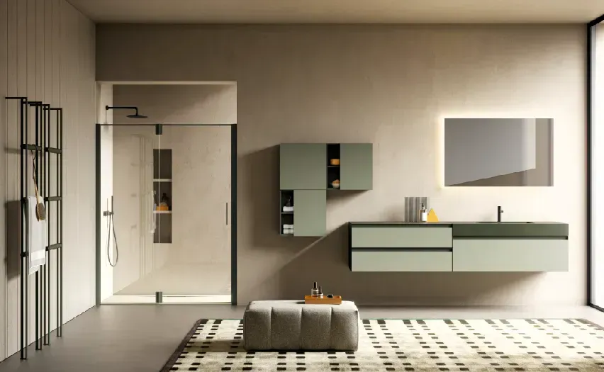 Bagno moderno con doccia, mobile lavabo e spazio per riporre gli oggetti in tonalità neutre.