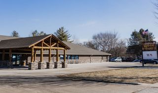 A large building with a sign that says lodge on it.