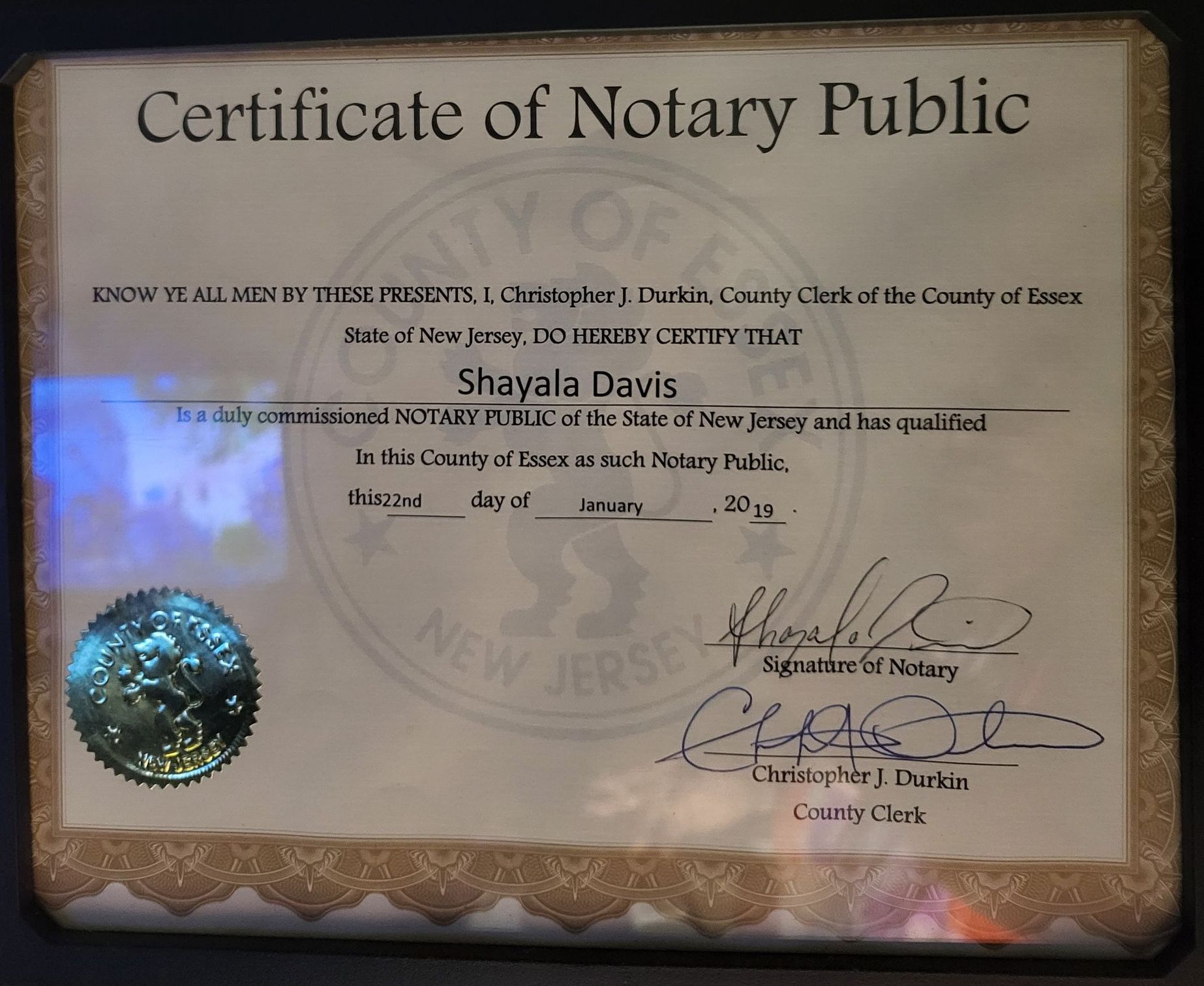 A certificate of notary public signed by shayala davis