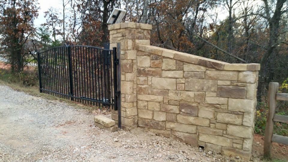 Custom Fencing - Stone Gateway and Wrought Iron Fence in Oklahoma City, OK