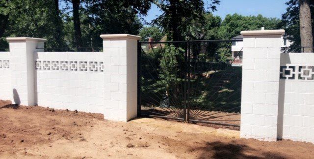 Gate Installation - Wrought Iron Entry Gate and Stone Fence in Oklahoma City, OK