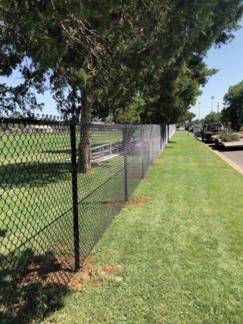Commercial Fencing - Black Chain Link Fencing in a Park in Oklahoma City, OK