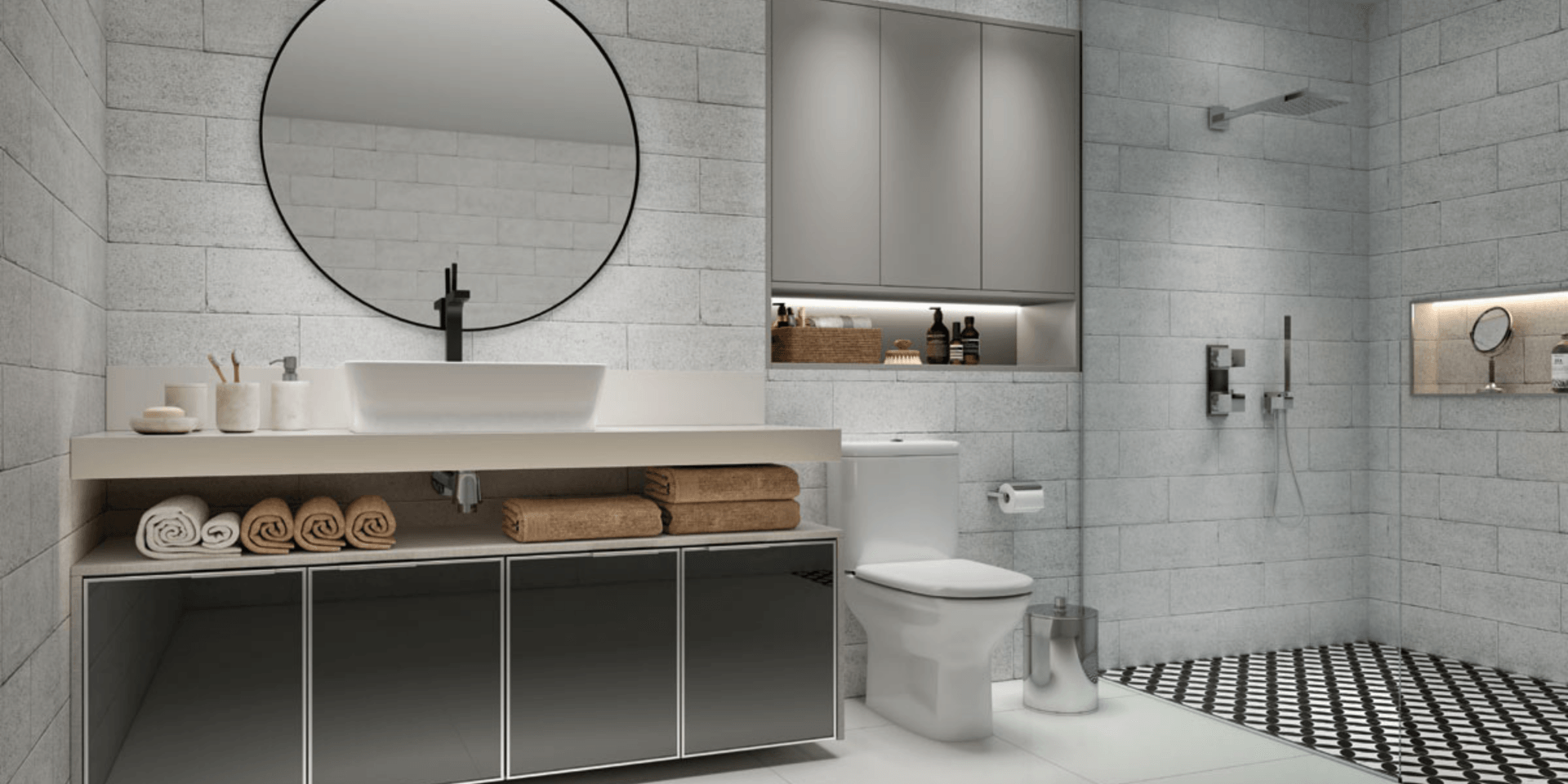 Un baño con inodoro, lavabo, espejo y ducha.