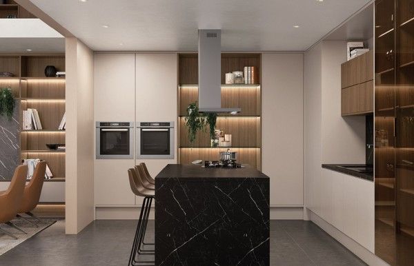 Una cocina con una gran isla en el medio.