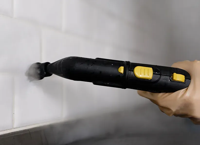 Cleaning a White Tiled Kitchen Wall — Capital Pro Care in Greenway, ACT