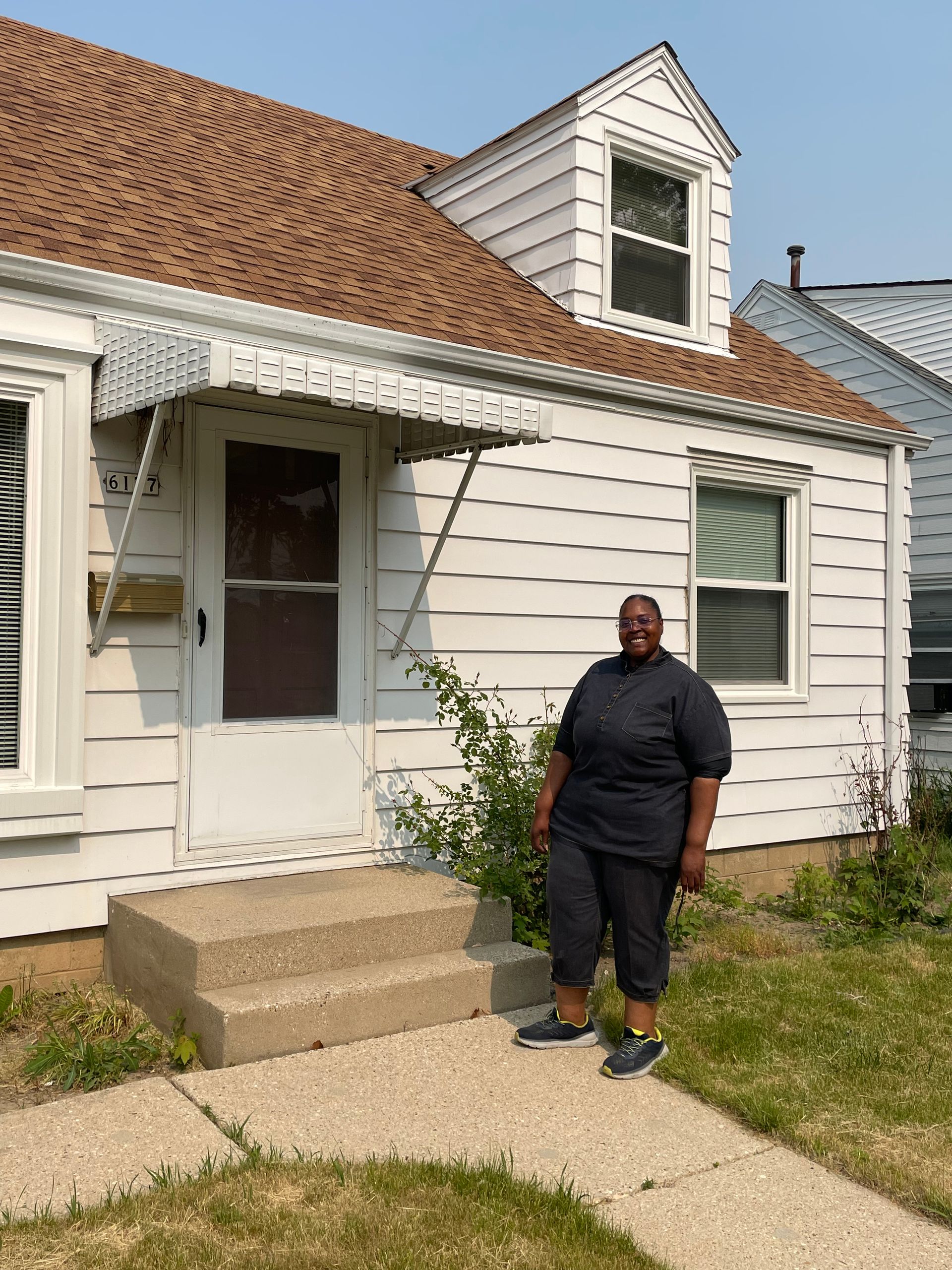 Three women are standing next to each other holding a sign that says just closed.