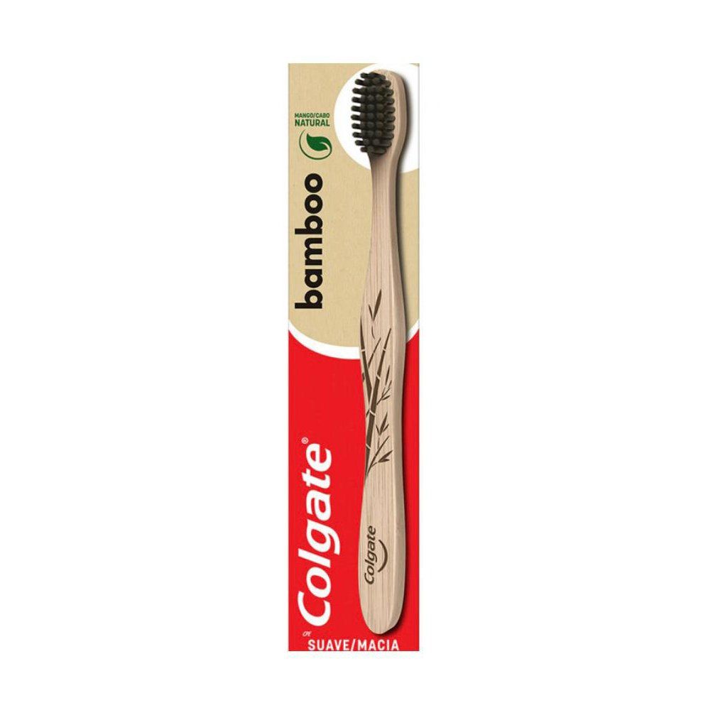 Cepillo de dientes Colgate de bambú con cerdas negras y mango de madera natural.