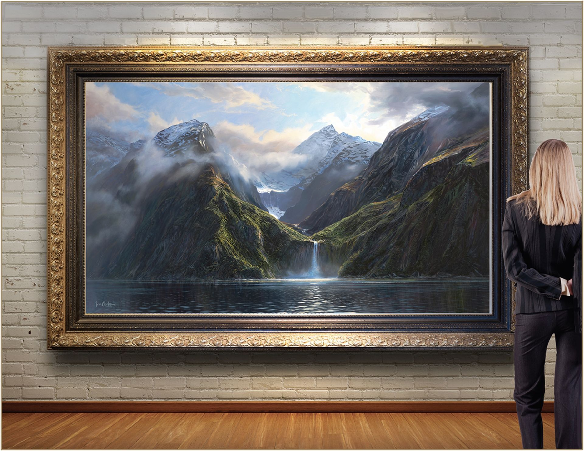 A misty, majestic fjord with steep, green, rocky cliffs and a waterfall cascading into the water under a bright sky.
