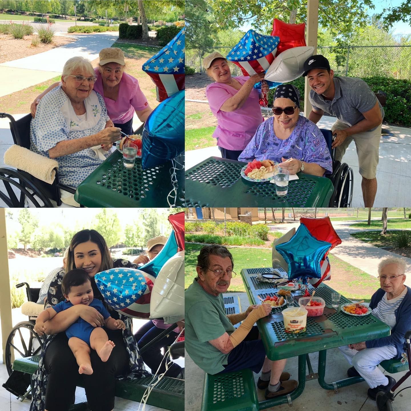 A group of people are sitting at a picnic table in a park