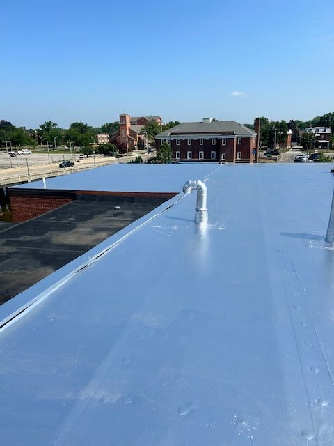 Shiny silver roof on a commercial building.
