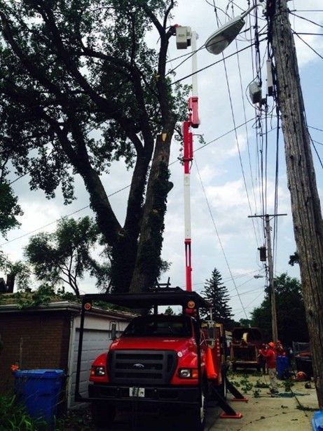 A red truck with a pole on top