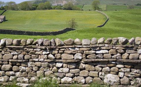 Durable stone walling and cladding