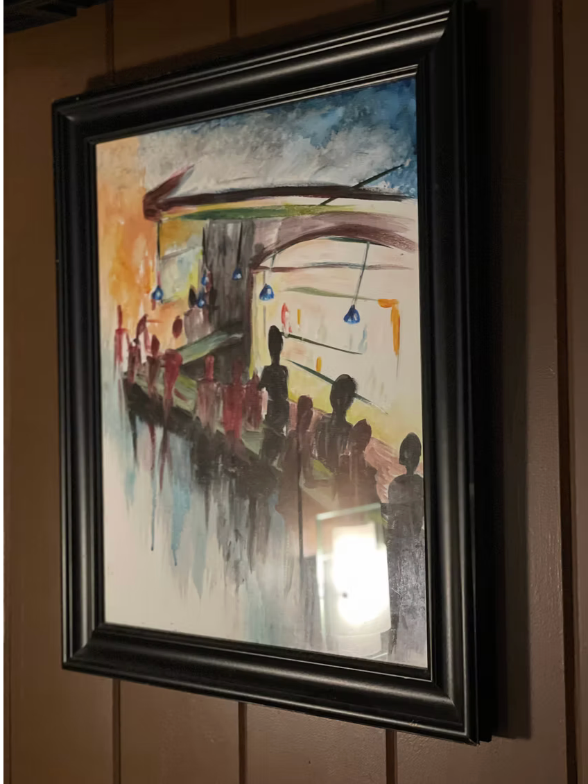 A framed painting of a group of people on a boat